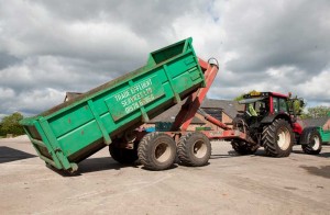 Tractor dropping off Skip