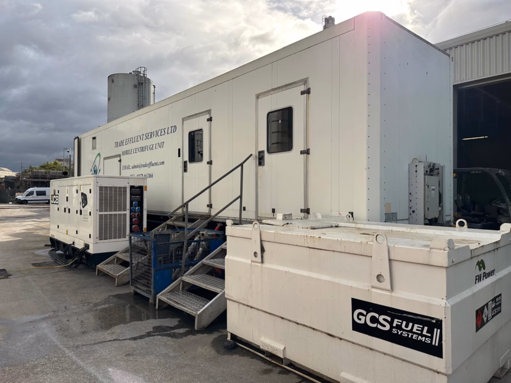 Mobile Centrifuge Unit on site and operating. With accessible stairs, and generators on show